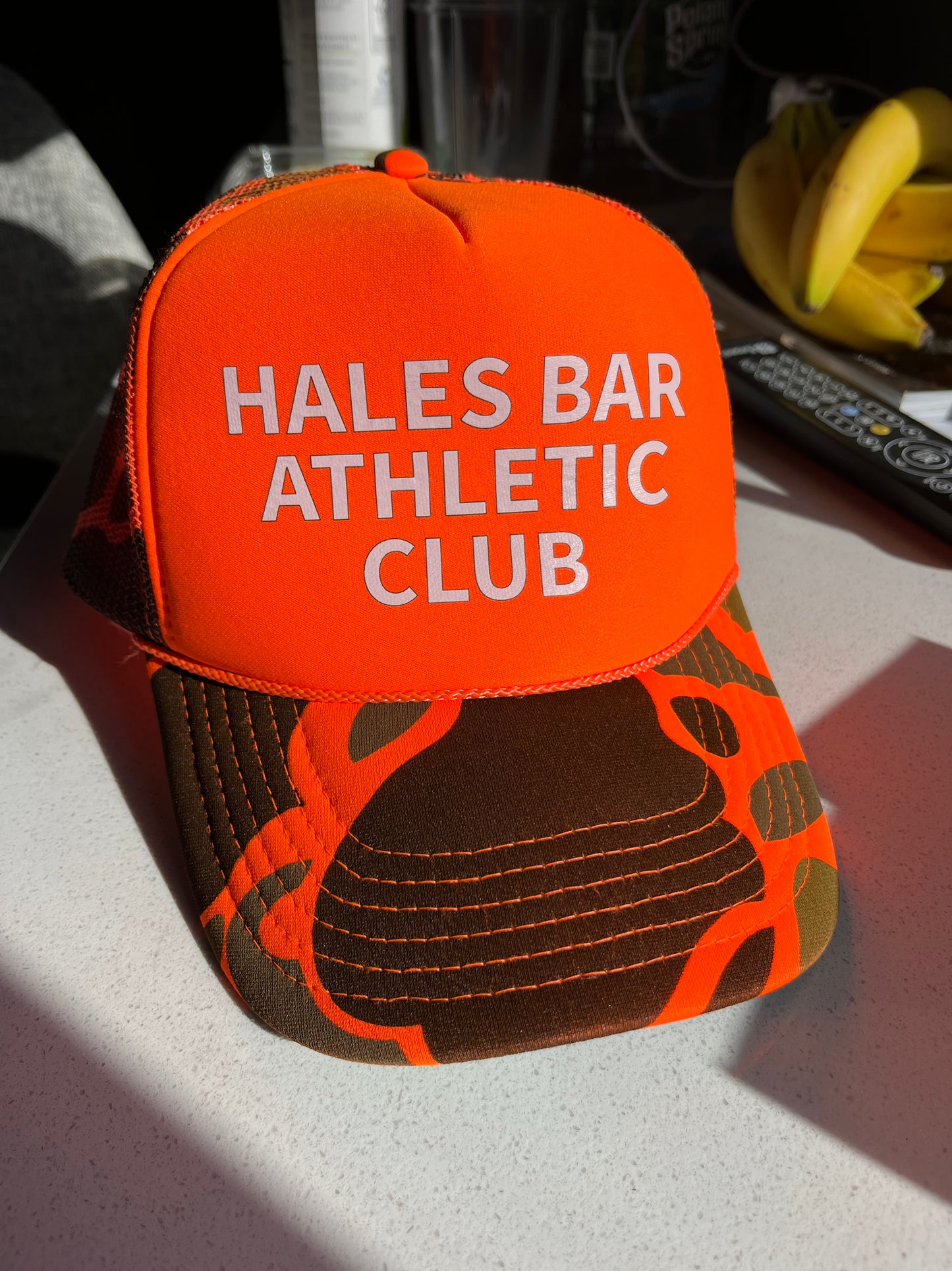 Hales Bar Athletic Club blaze camo trucker